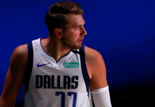 开云体育下载-【人物】天才少年终遇挫折 东契奇能否走出困境？